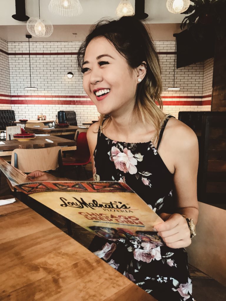 Demi Bang, an Arizona lifestyle blogger, at Lou malnati's Pizzeria in Scottsdale, Arizona.