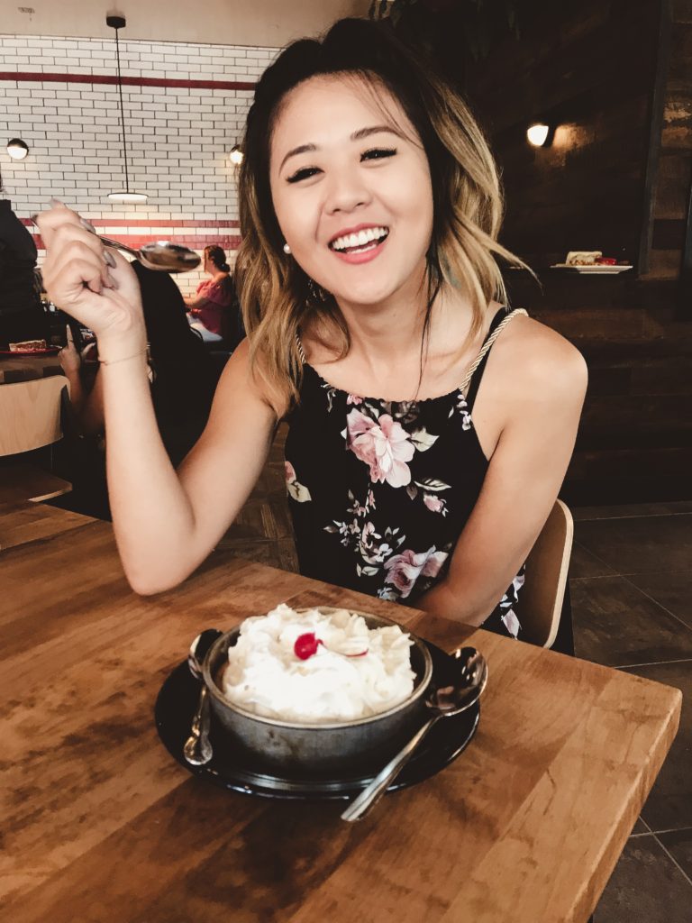 Demi Bang, an lifestyle blogger, eating ice cream at Lou malnati's Pizzeria in Phoenix, Arizona.
