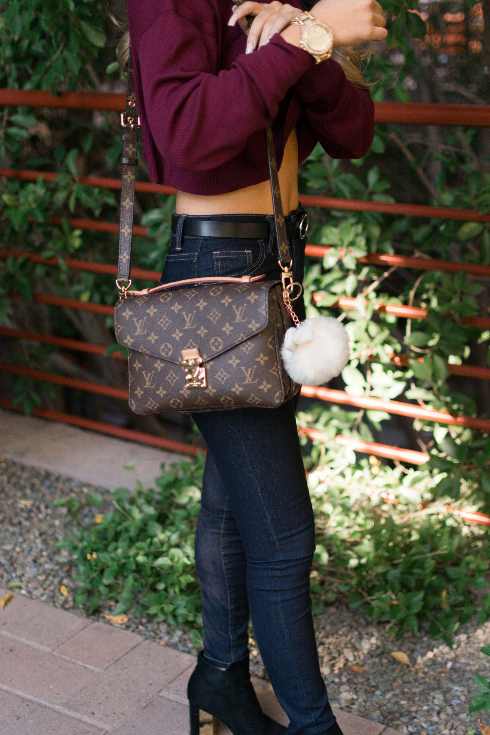 Lifestyle blogger Demi Bang talks about what she keeps in her louis vuitton pochette metis bag and her review.