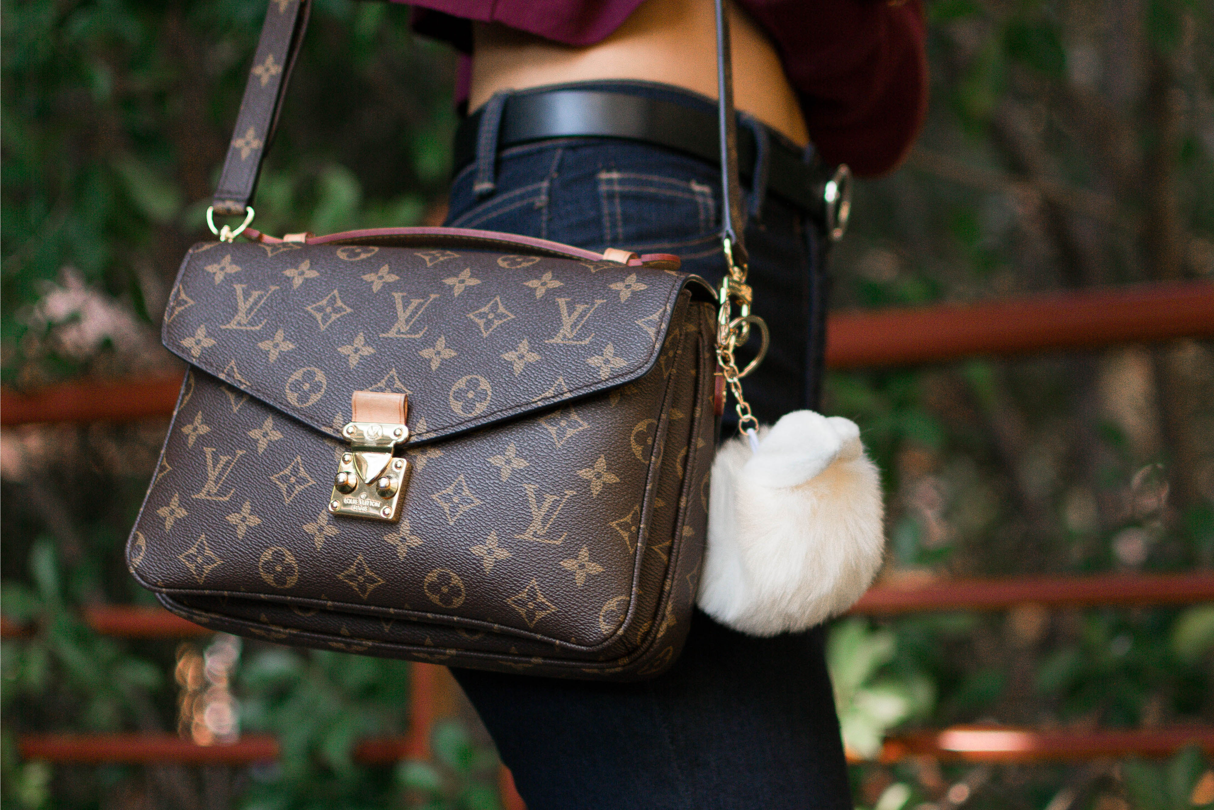Lifestyle blogger Demi Bang talks about what she keeps in her louis vuitton pochette metis bag and her review.