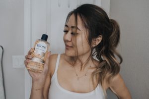 Lifestyle blogger Demi Bang using Biore Witch Hazel Toner.