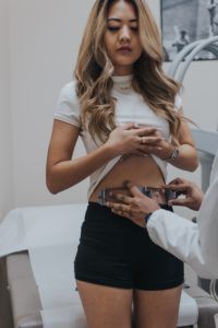 Demi Bang trying out SculpSure, also known as WarmSculpting, in Peoria, Arizona at Lux Aesthetics.
