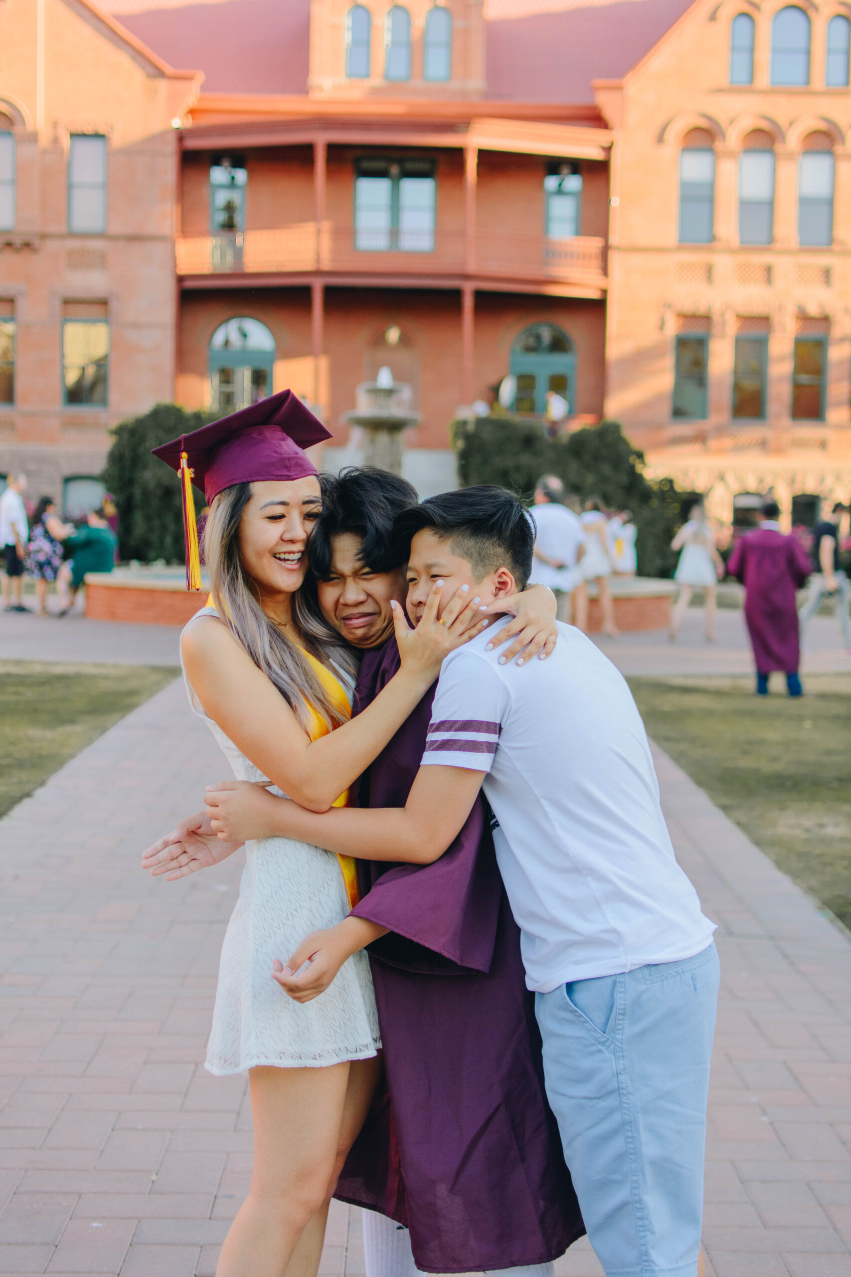 Demi Bang and her brothers at ASU for graduation photos.