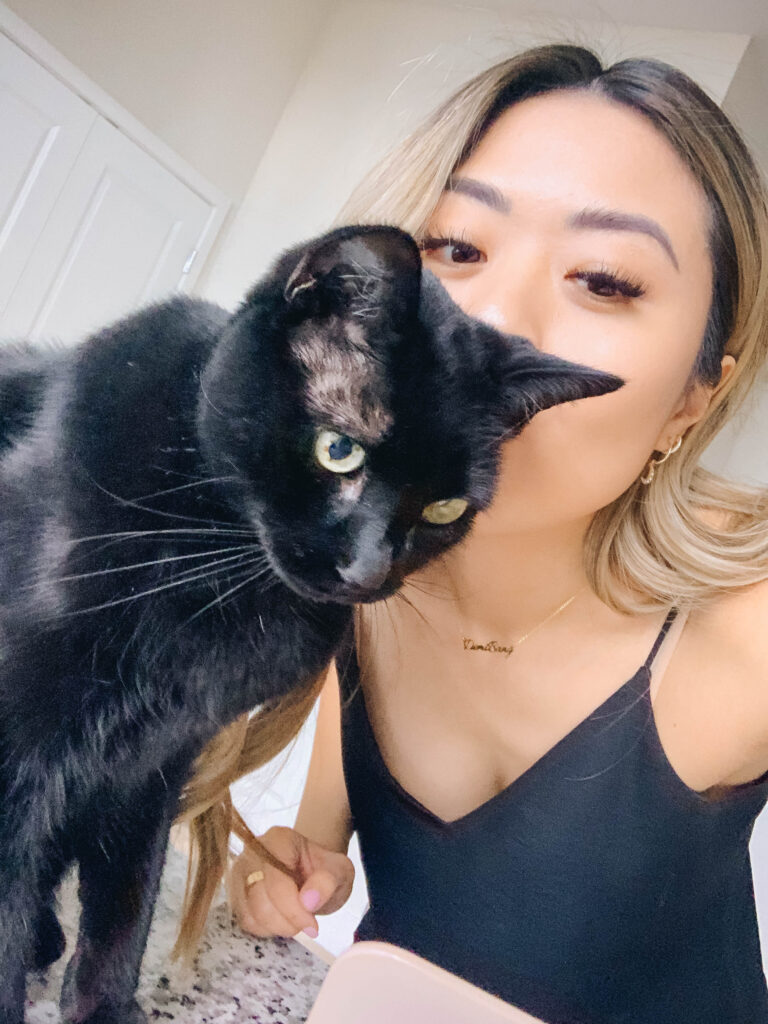 Demi Bang and her cat, Henry.