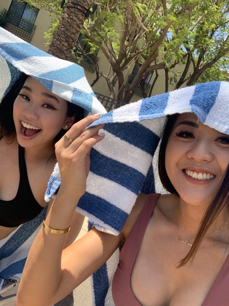 Arizona influencer Demi Bang and Han Luu enjoying the Oasis Pool Bar at Hilton Scottsdale.