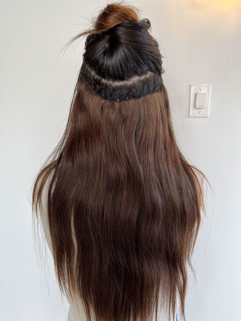 Arizona blogger Demi Bang talks about hand-tied weft hair extensions and showcases her grown out hair extensions.