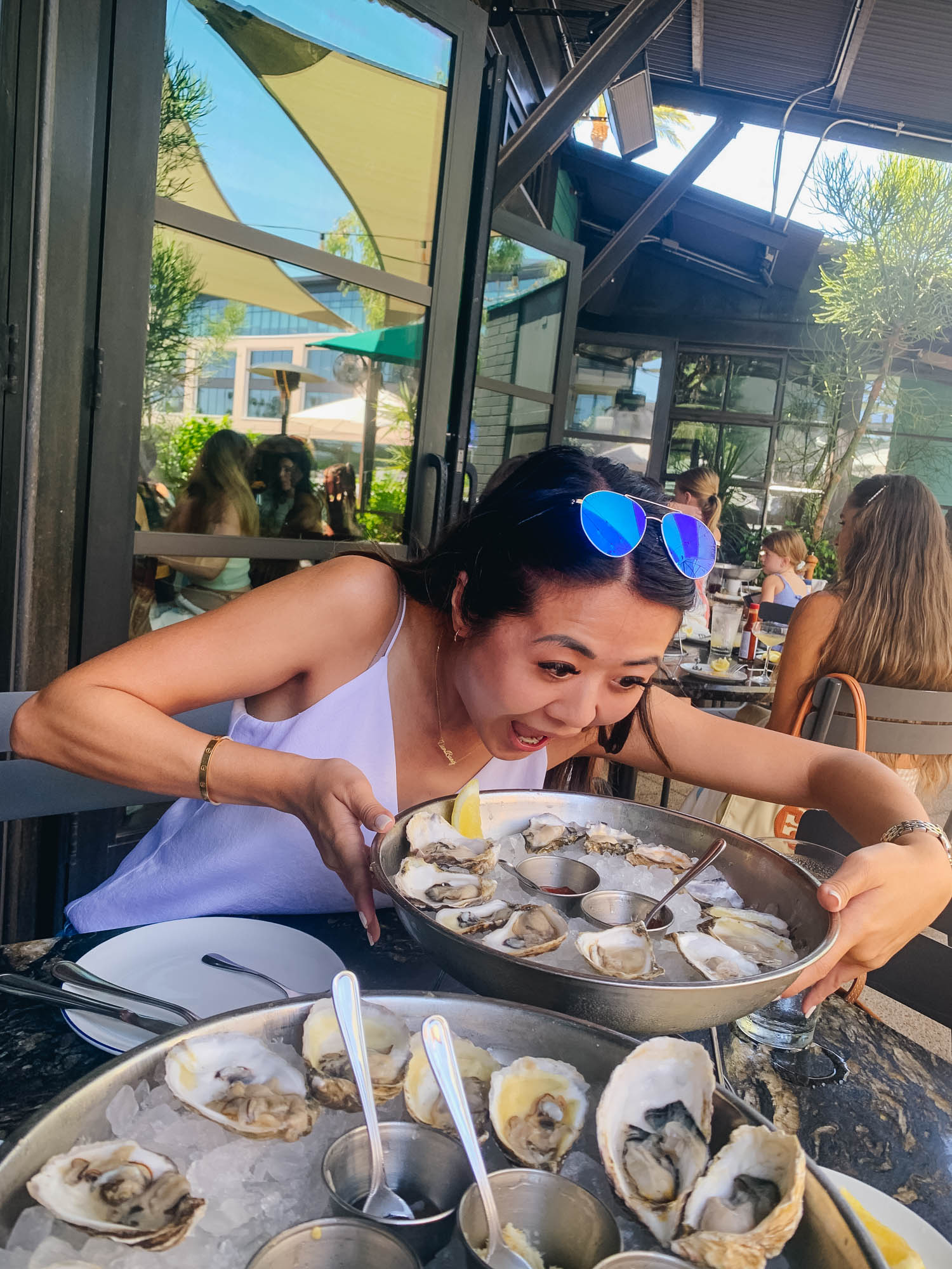 Blogger Demi Bang eating oysters after getting her adult braces on.