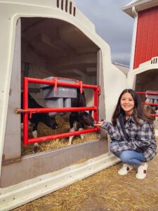 Arizona blogger Demi Bang visiting a dairy farm in Sterling, Ohio.