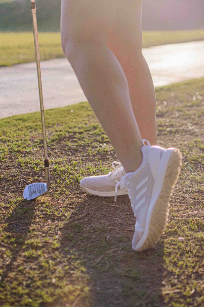 Demi Bang wearing women golfing shoes.