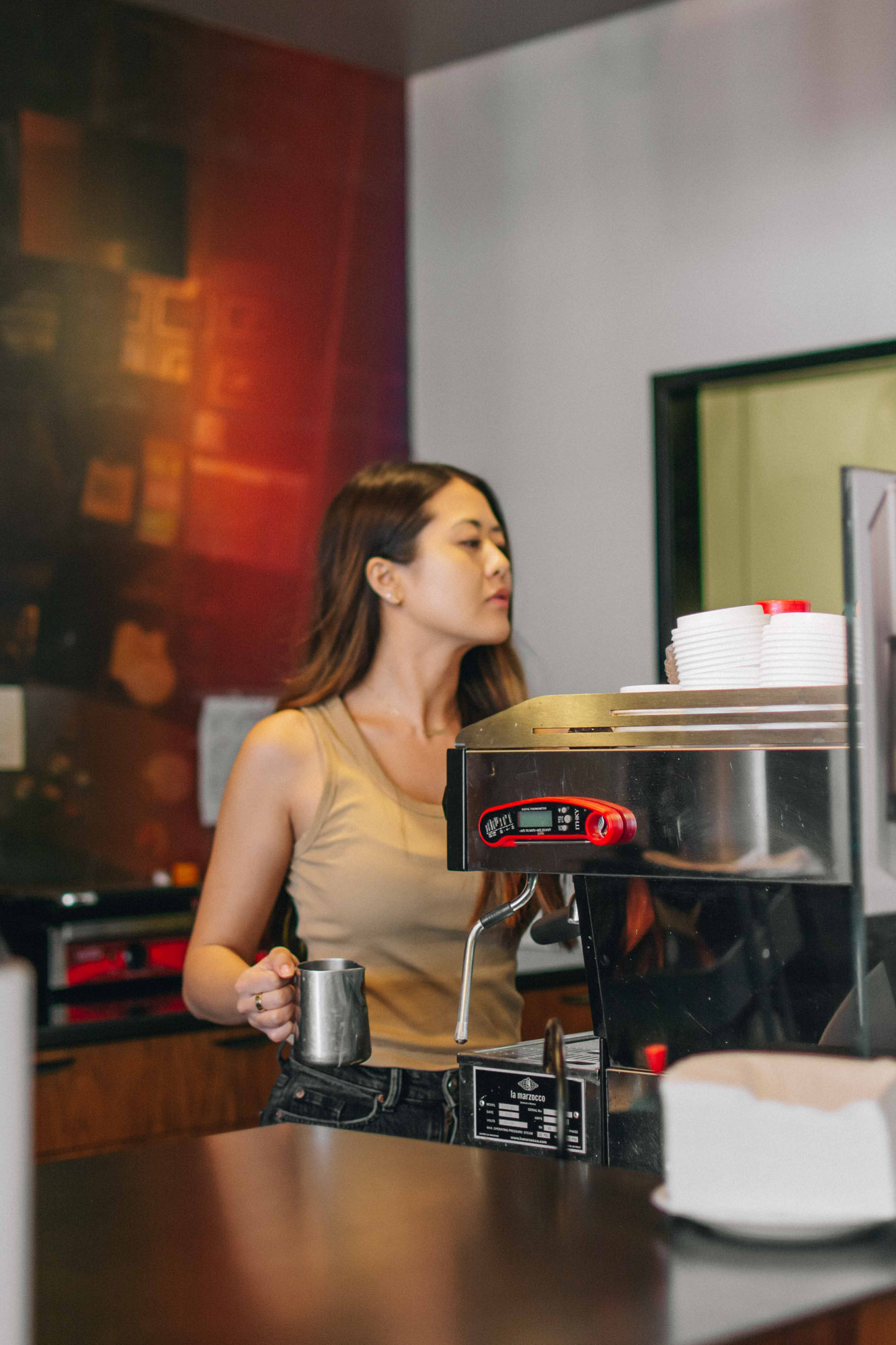 Demi Bang working at a speciality coffee shop.