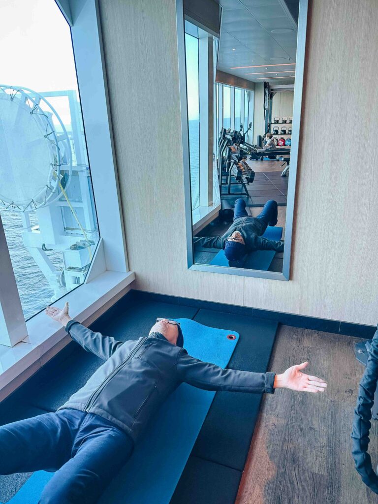 Doing mat pilates on a cruise ship.